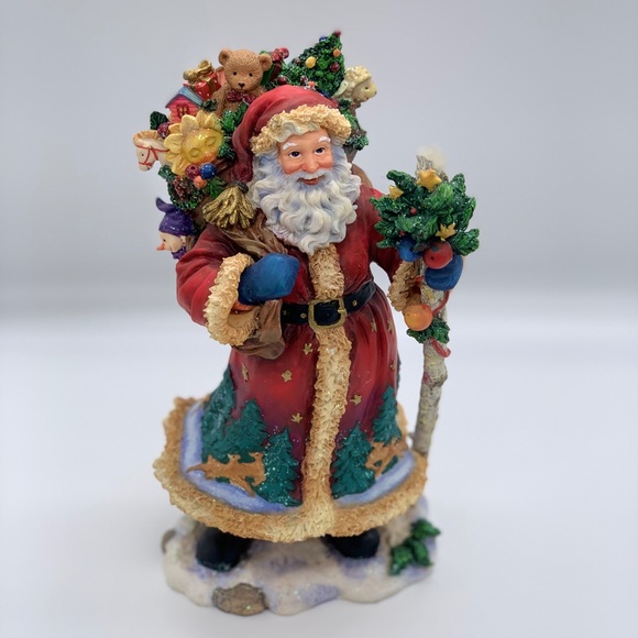 KURT S. ADLER SANTA’S WORLD FIGURINE